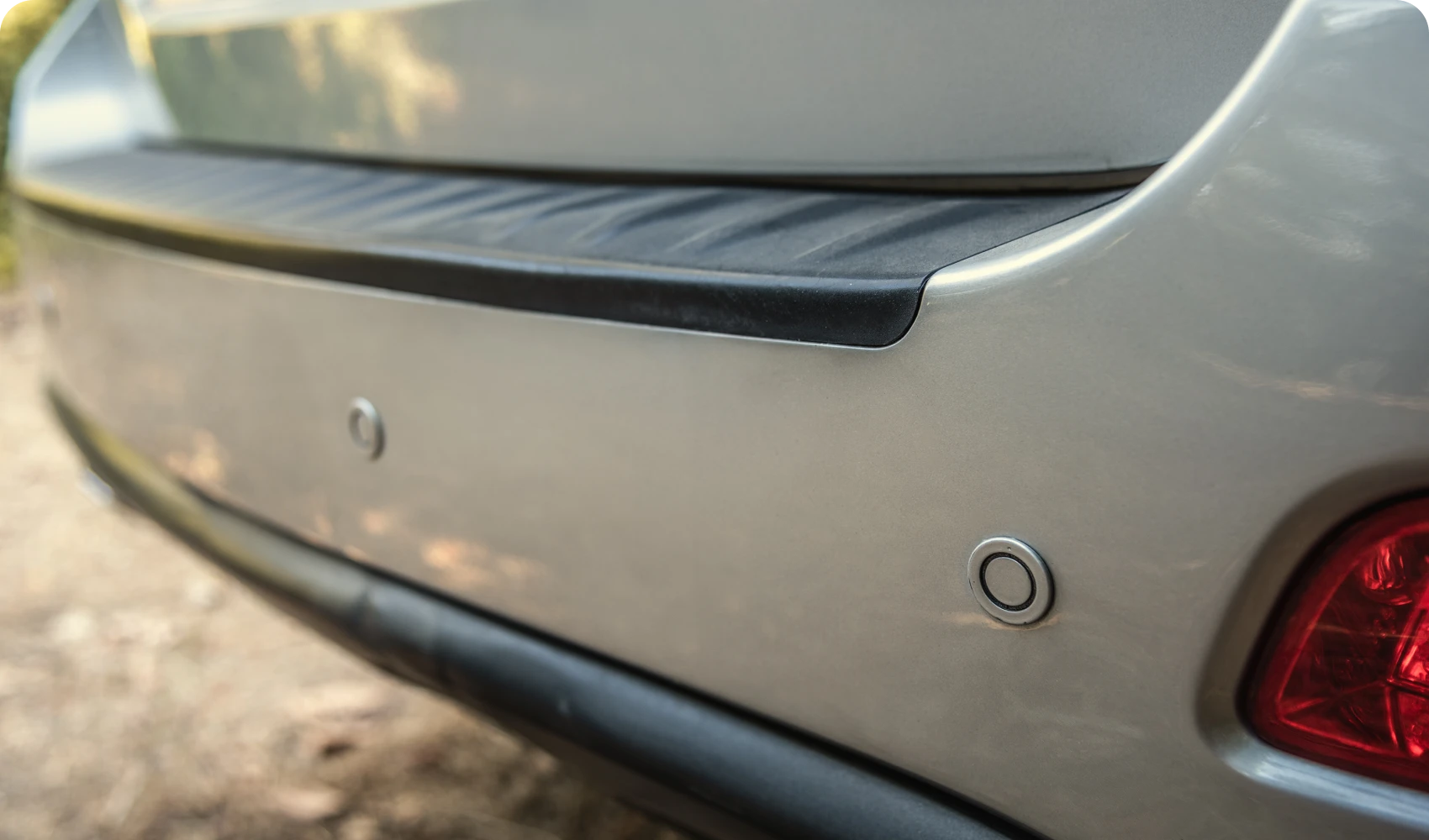 Car rear bumper with sensors